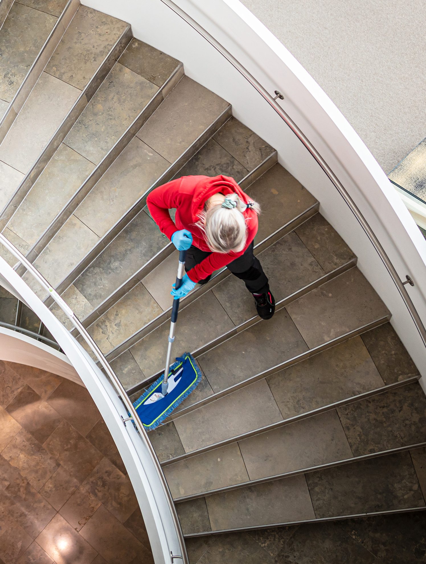 Women cleaning the stairs