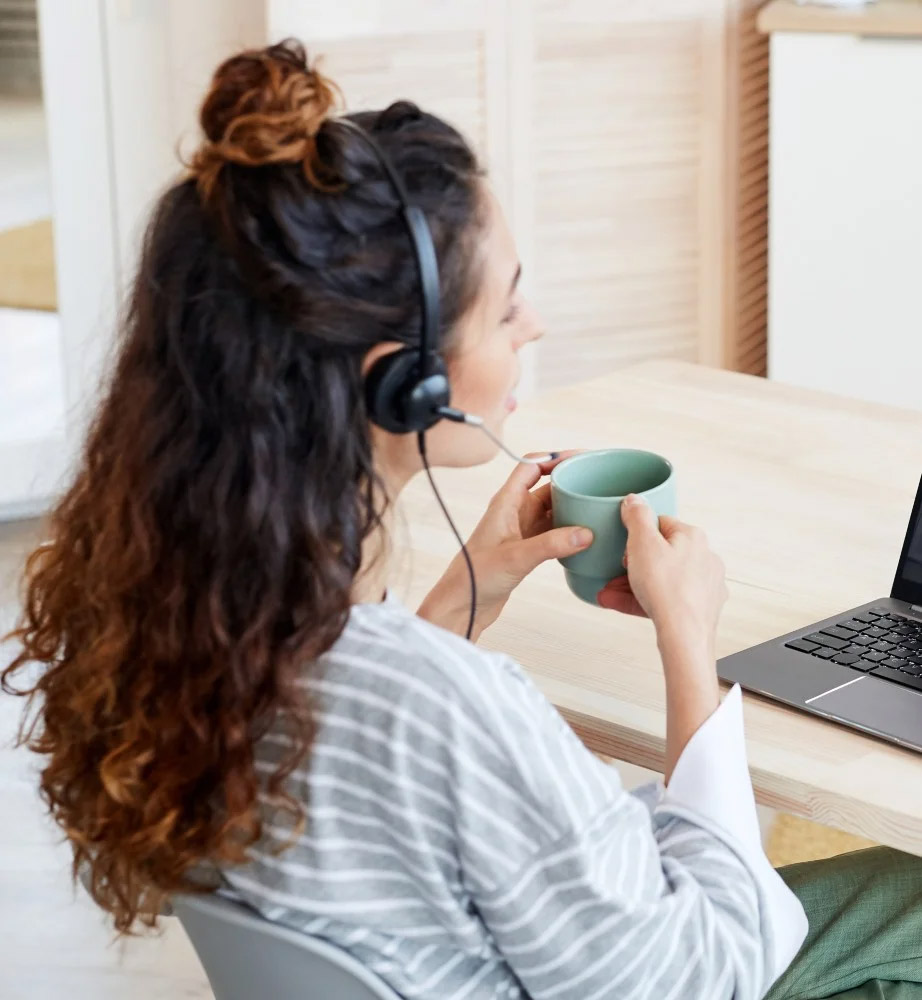 women on a online meeting and drinking coffee